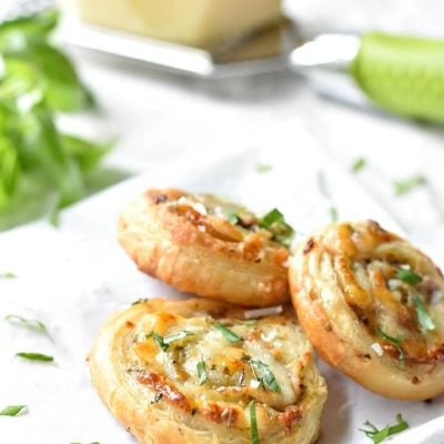 Puff Pastry Pinwheels with Prosciutto, Pesto, and Cheese