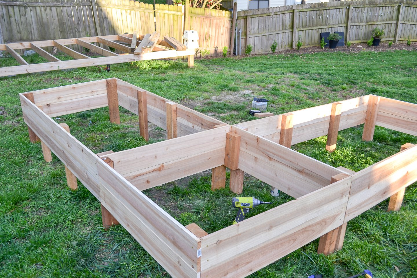 positioning new garden bed in place