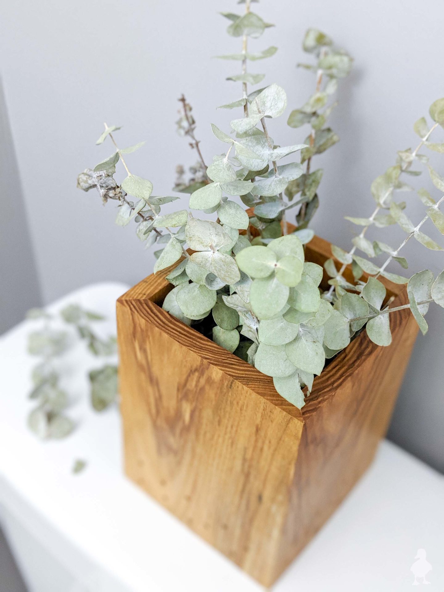 diy bathroom baking soda deodorizer vase with essential oil and eucalyptus