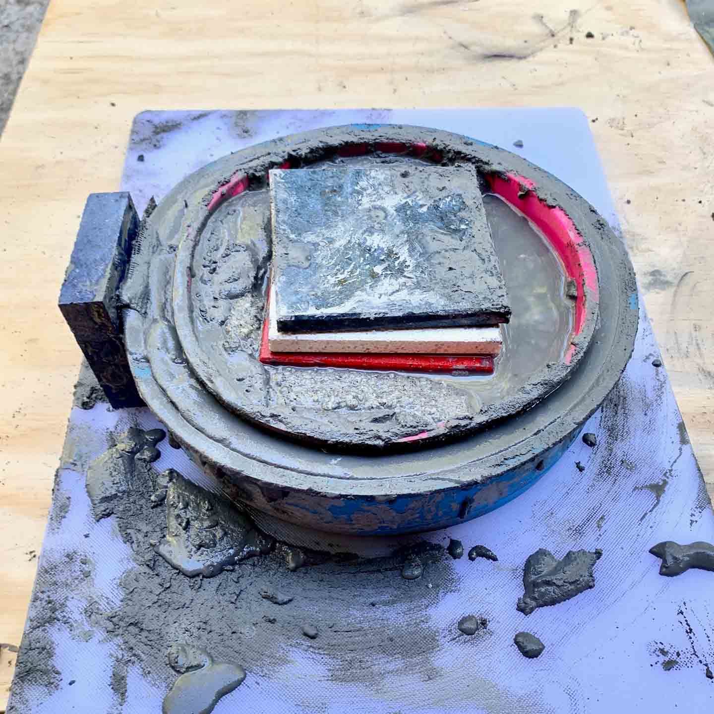 block on side of mold
