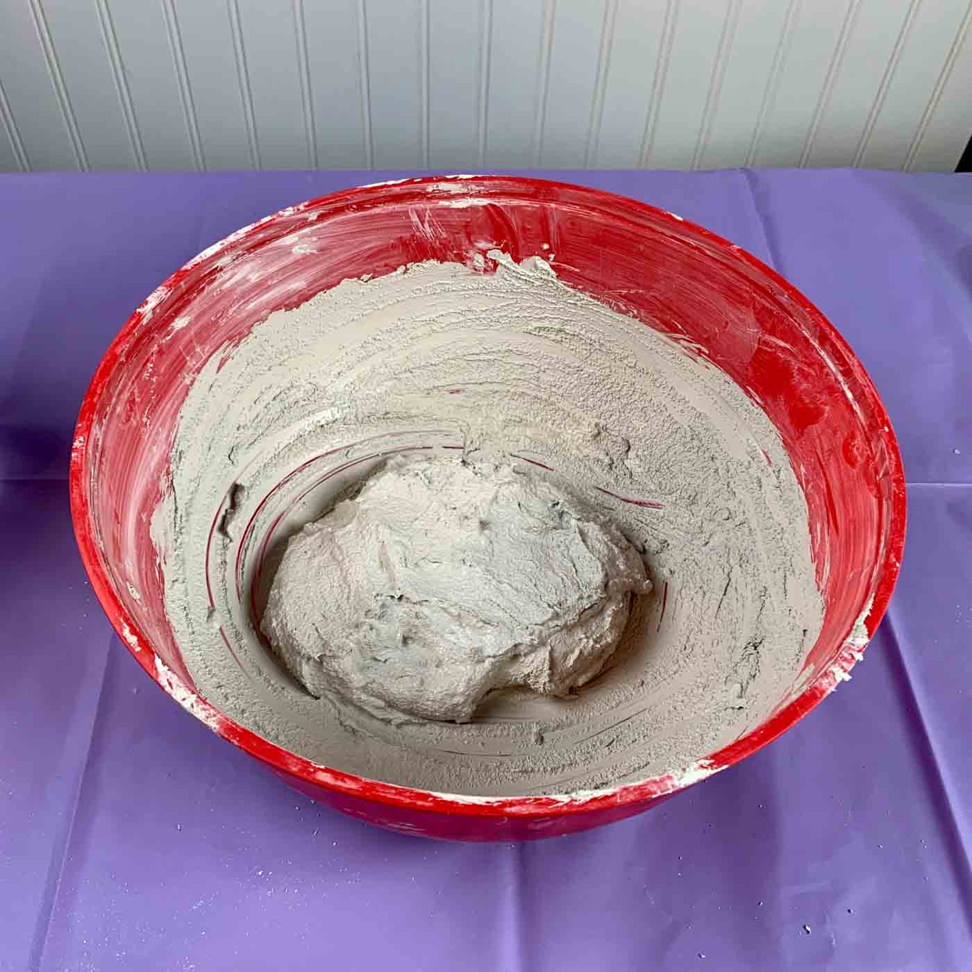 bowl with cement mix for white cement river planter