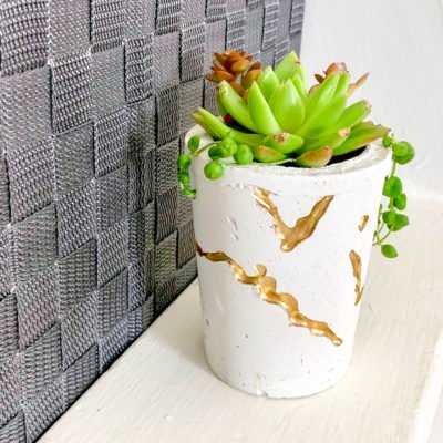 diy white cement planter with gold leaf river